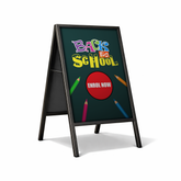 A-frame sign with 'Back to School' and 'Enrol Now' text on a white background