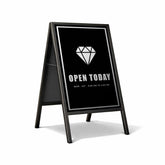 A-frame sign with a diamond icon and opening hours on a white background