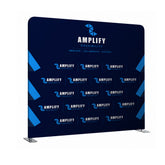 Blue promotional display with 'Amplify' branding on a white background