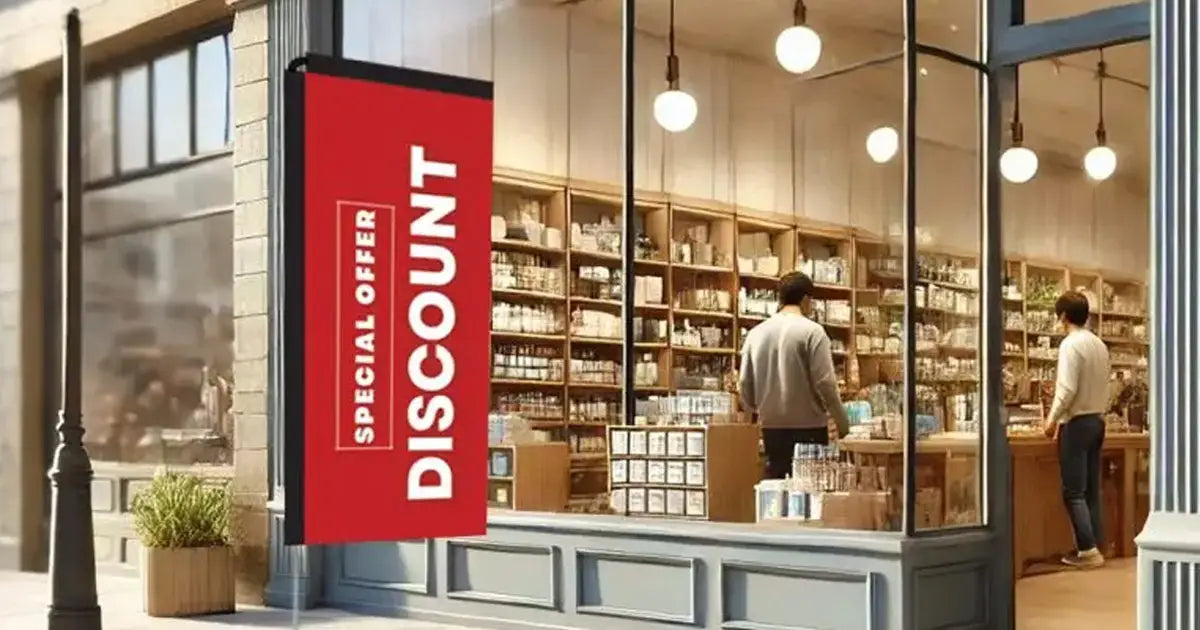 Portable red promotional banner outside a shopfront advertising a special offer discount | Custom signage by Evan Evans Australia