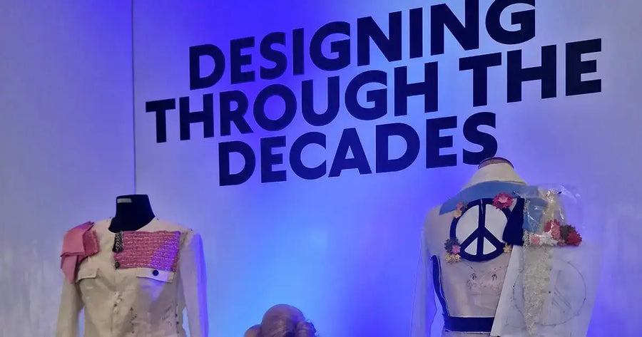 Mother Play costume exhibit at Melbourne Theatre Company with Evan Evans signage