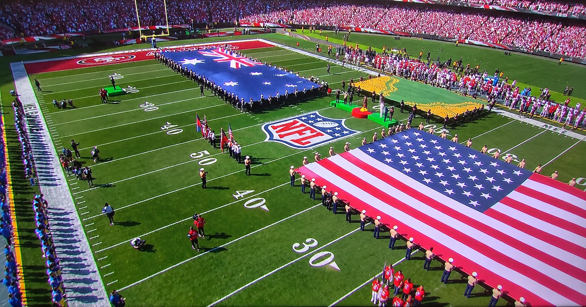 Giant Australian & American Flags Made by Evan Evans Take Centre Stage at the MCG | Custom signage by Evan Evans Australia