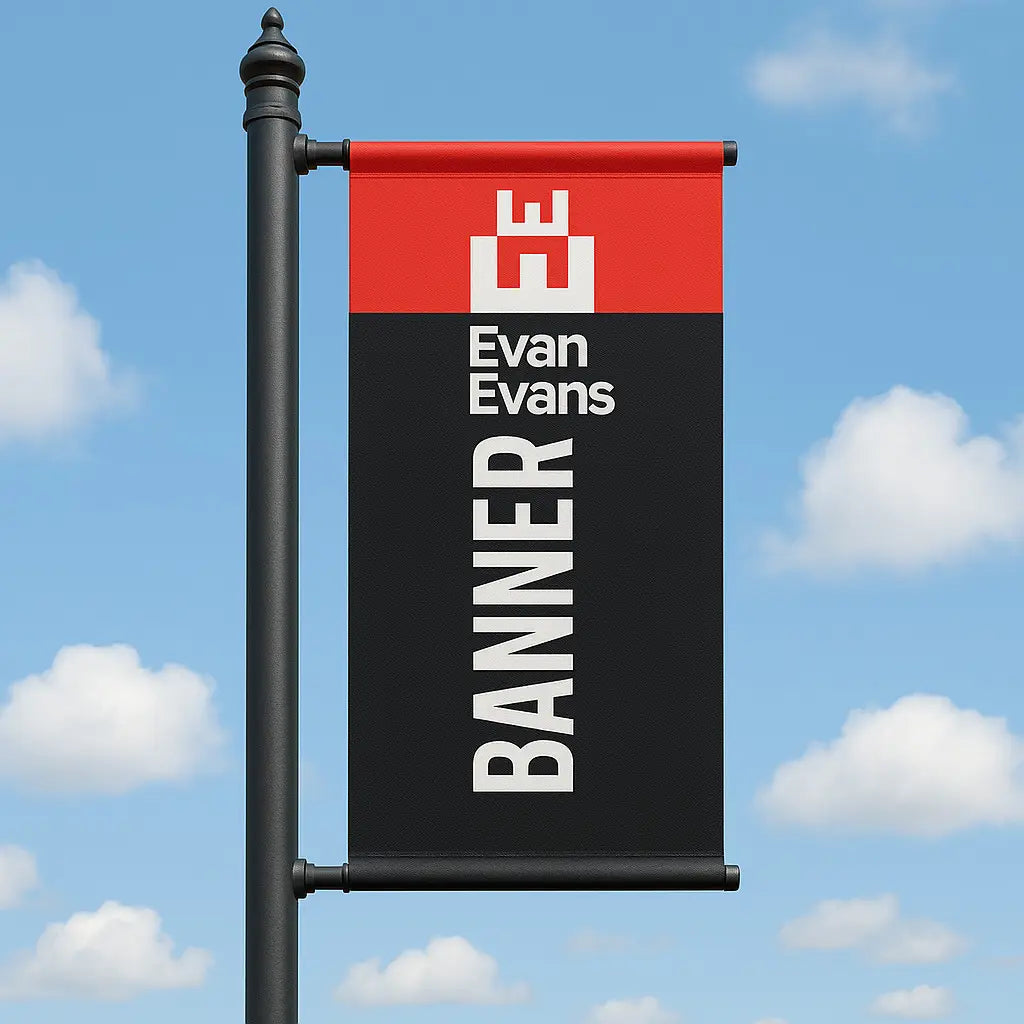 A photograph captures a banner mockup for Evan Evan