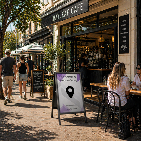People walking by a cafe with a sign inviting them to become a member.