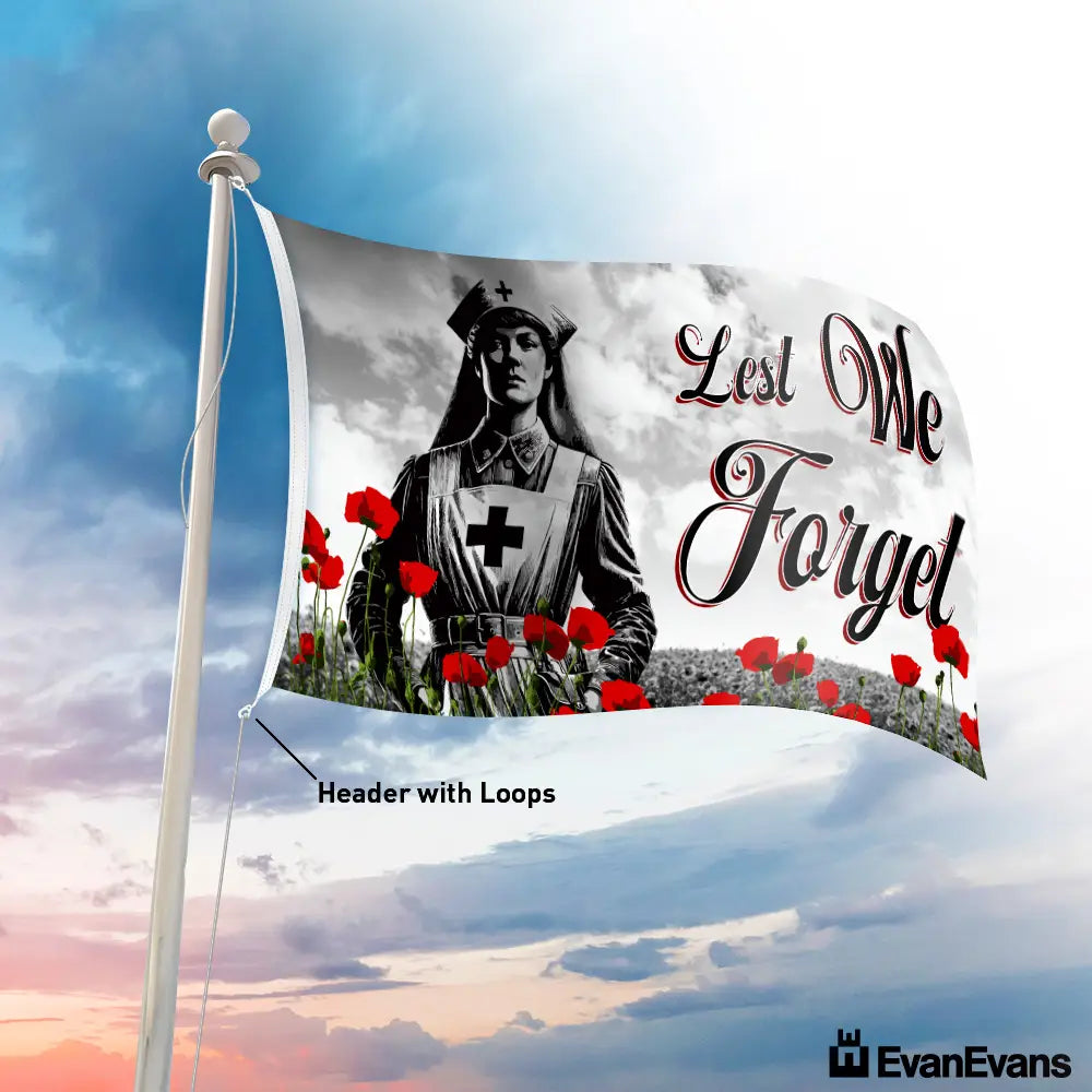 ANZAC nurse-themed Lest We Forget flag with red poppies flying on a pole.