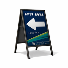 Outdoor sign with 'Open Home' and arrow on a white background