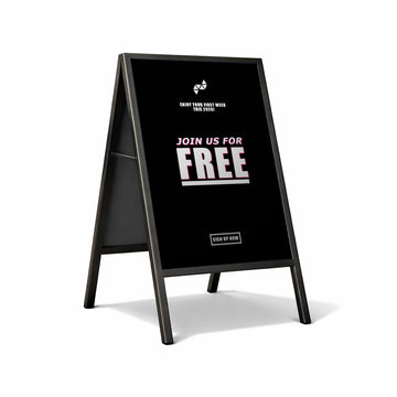 Black a-frame sign with white text inviting people to join for free on a white background