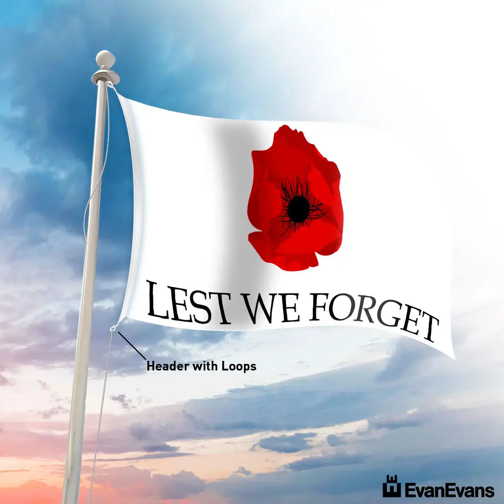 Lest We Forget Flag (Classic) featuring a bold red poppy and the words 'Lest We Forget,' flying on a flagpole.