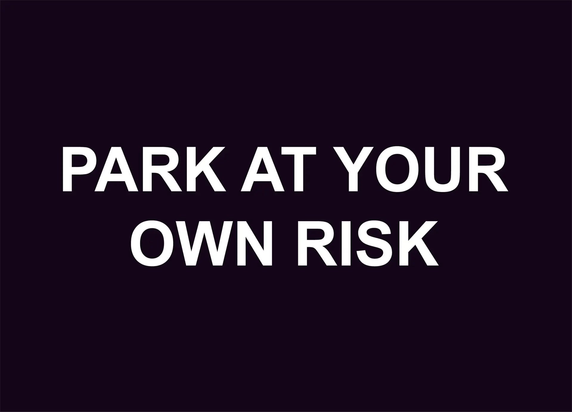 park at your own risk construction sign