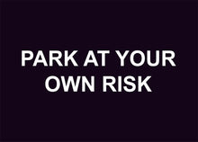 park at your own risk construction sign