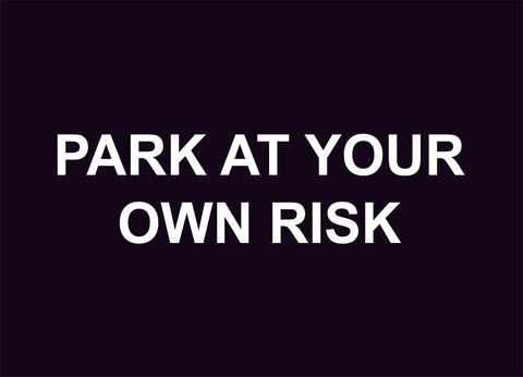 park at your own risk construction sign